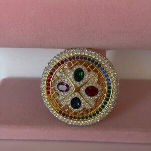 SWAROVSKI 1994 round rainbow brooch